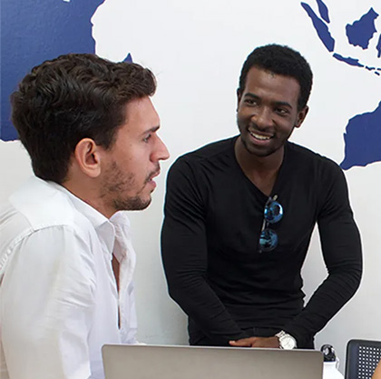 Two Geneva Business School students having a discussion